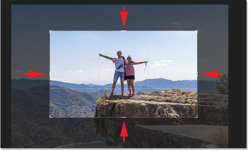 Dragging the handles to resize the crop border around the image
