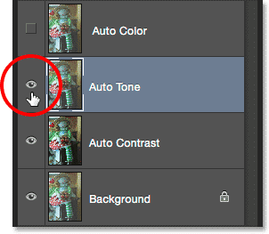 Selecting the Auto Tone layer in the Layers panel. Image © 2015 Photoshop Essentials.com