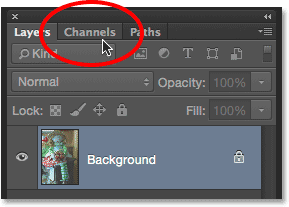 Clicking the Channels panel tab to open it. Image © 2015 Photoshop Essentials.com